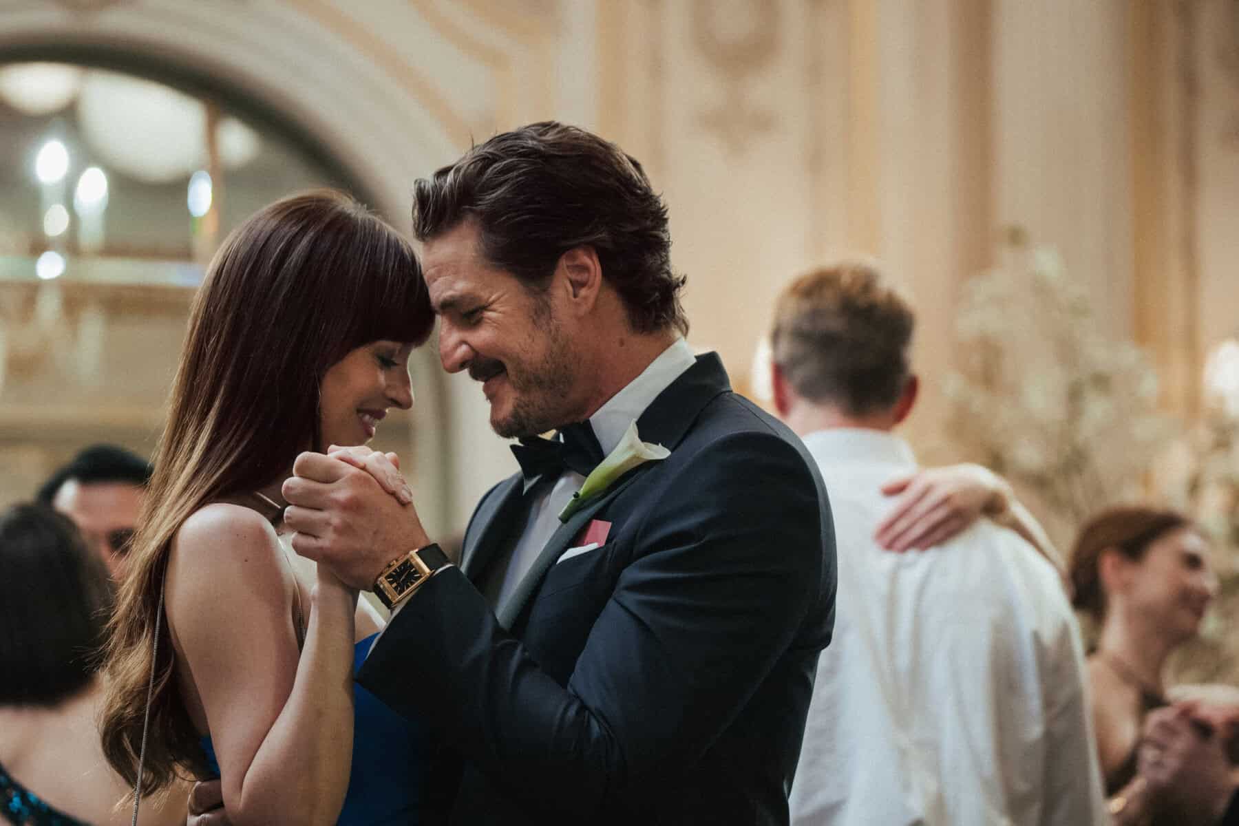 Elegant couple dancing at a wedding reception, showcasing love and celebration.
(L–R) Dakota Johnson and Pedro Pascal in Materialists (2024). Photo by Atsushi Nishijima. © A24. Image courtesy of A24 Press.