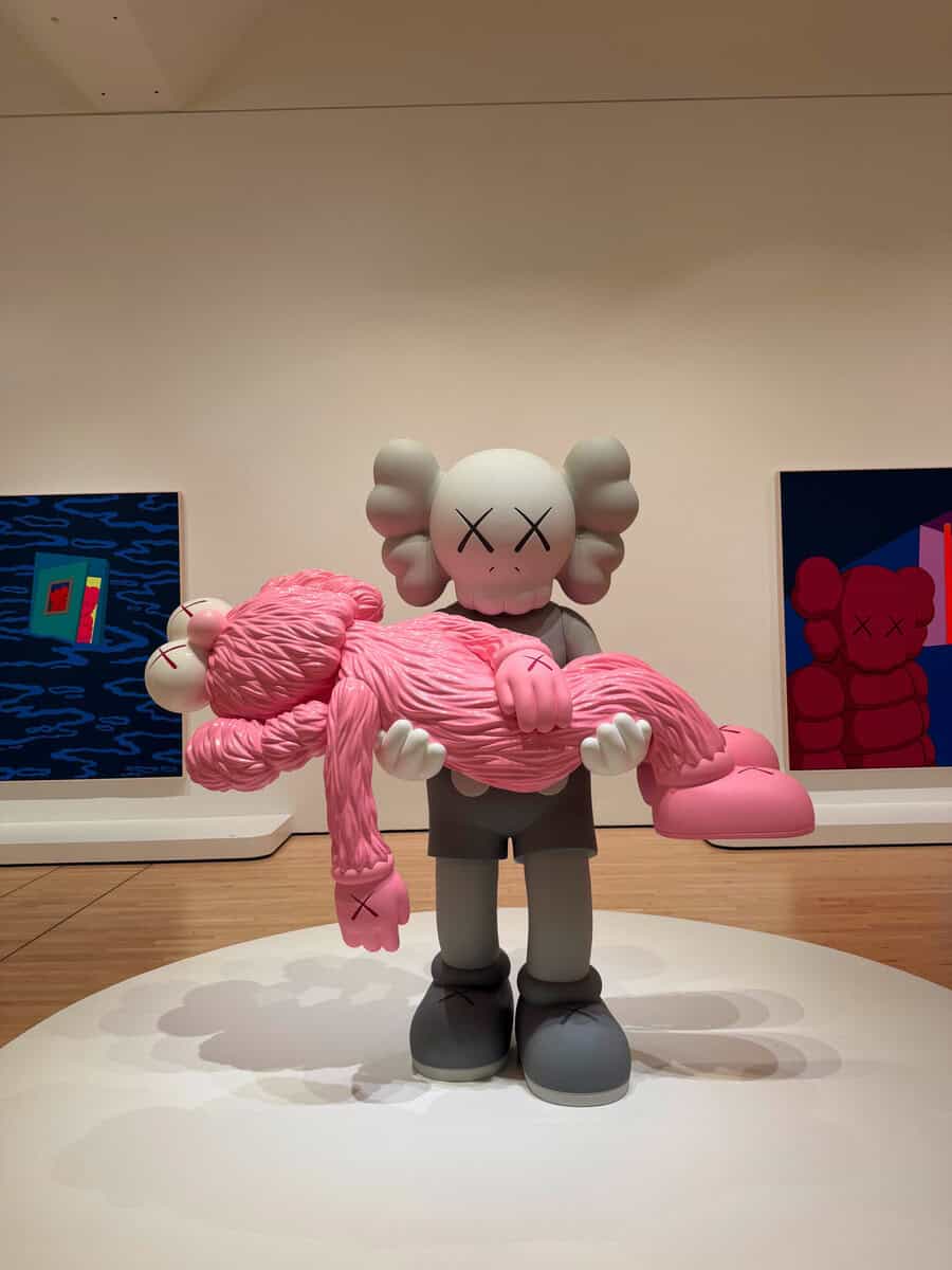 Vivid pop art sculpture by KAWS at The Jason Journal.